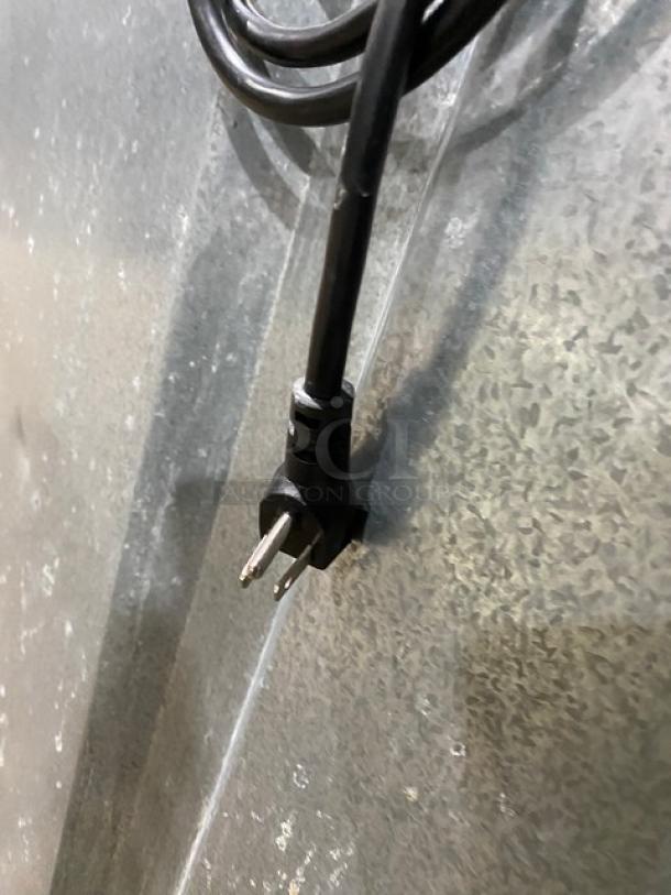 Continental 1R Single Door Refrigerator plug detail on stainless steel surface, 115V, poly coated racks, on casters.