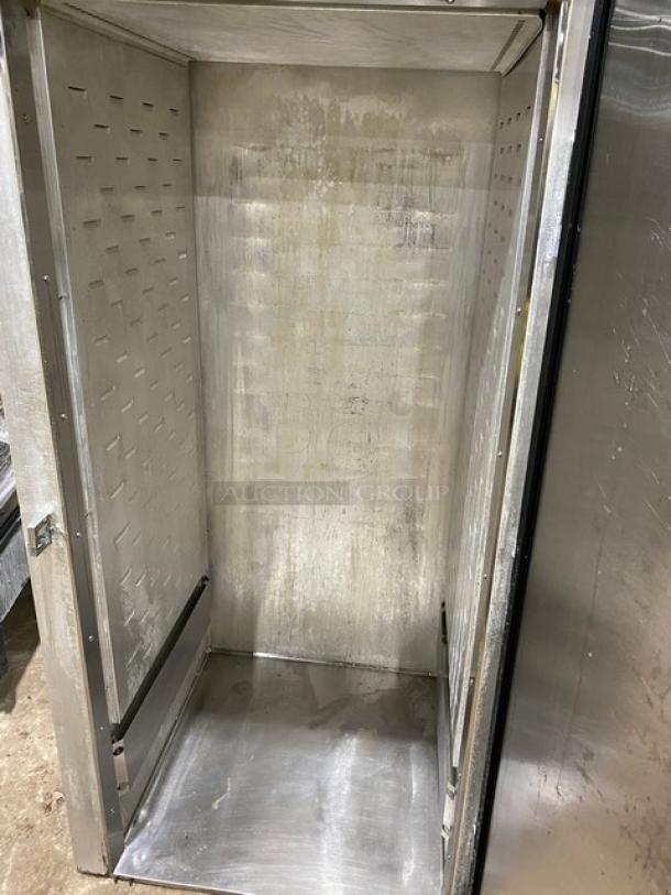 Continental single-door food warmer, all stainless steel, commercial use, visible interior shelving grooves, good condition.