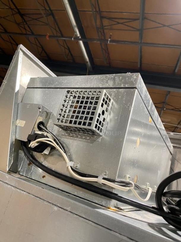 Continental Commercial Single Door Food Warmer in stainless steel, visible wiring and ventilation, sturdy construction.