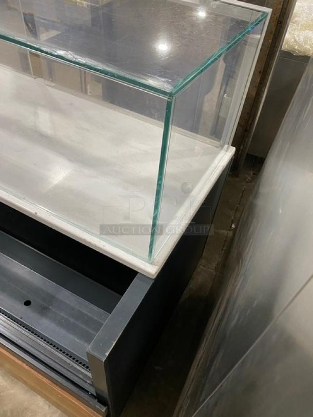 Structural Concepts commercial multi-level refrigerated open display case with upper glass showcase, rear sliding doors.