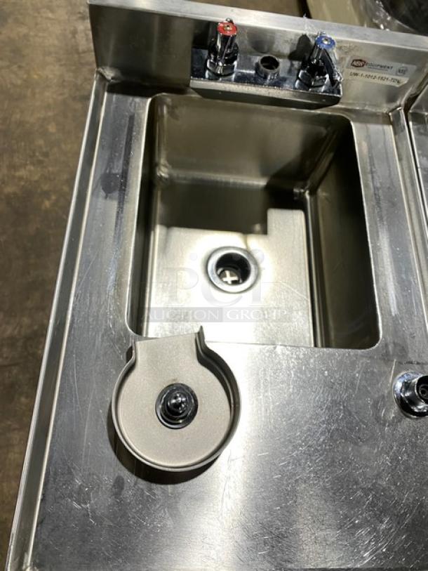 NBR stainless steel under-bar sink model UW110121521TDV with drying rack, hand sink, and speed rail. New condition.