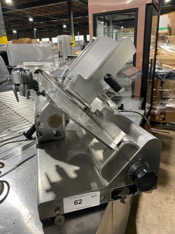 Globe Model 50 deli meat slicer, stainless steel, heavy duty, countertop design, visible settings knob, serial 626679.