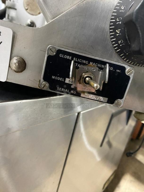 Globe Commercial Model 50 deli meat slicer, stainless steel, serial 626679, with operational dials, durable condition.
