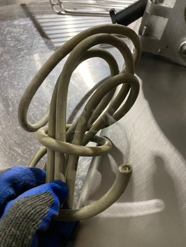 Globe Model 50 deli meat slicer, stainless steel, heavy-duty, missing power plug, visible cable wear, serial 626679.