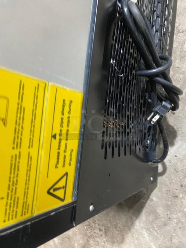 Avantco Commercial Display Case, Model 189BVAC36HC, with a visible power cord and safety label, in good condition.