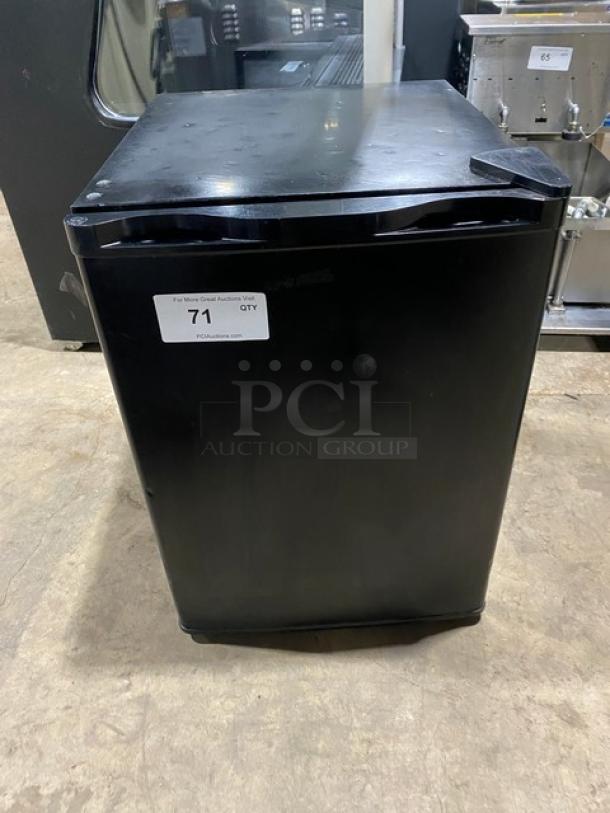 2020 Antarctic Star BD60E Countertop Single Door Freezer, black finish, includes poly coated racks, model label visible.