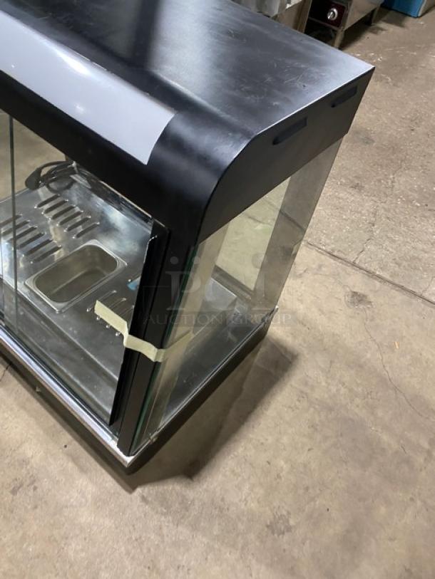 Commercial countertop warming food display case, Model FW22. Glass showcase with 2 sliding rear doors, 110V, 1Phase.