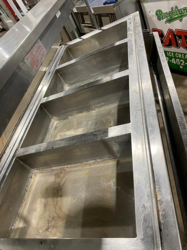 Atlas Metal 4 bay steam table, model VIH4, with sneeze guard and lowering prep line, serial n6772, 240V, on casters.