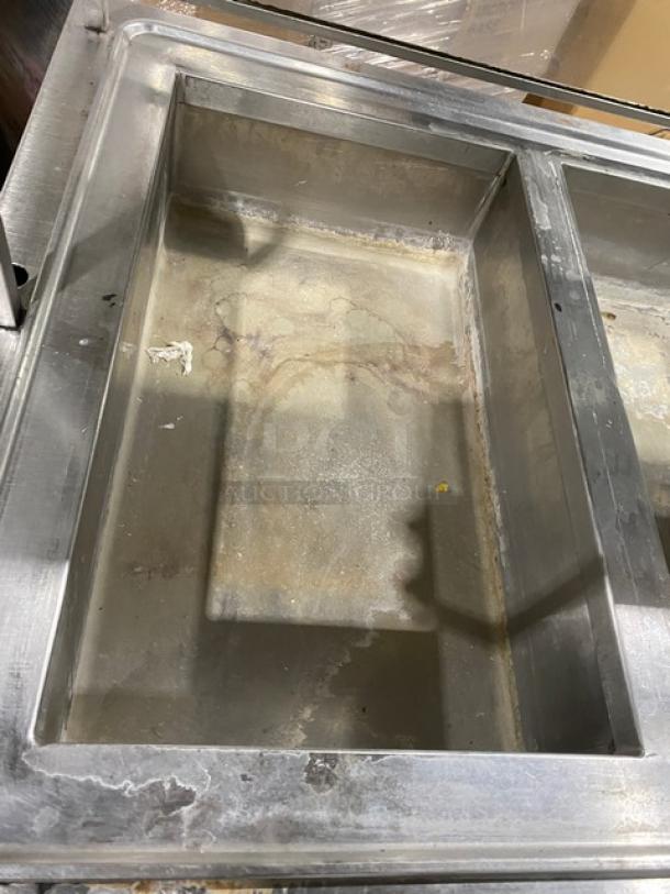 Atlas Metal 4-bay steam table, Model VIH4. Includes sneeze guard, lowering prep/serve line, on casters, 240V. Visible wear.