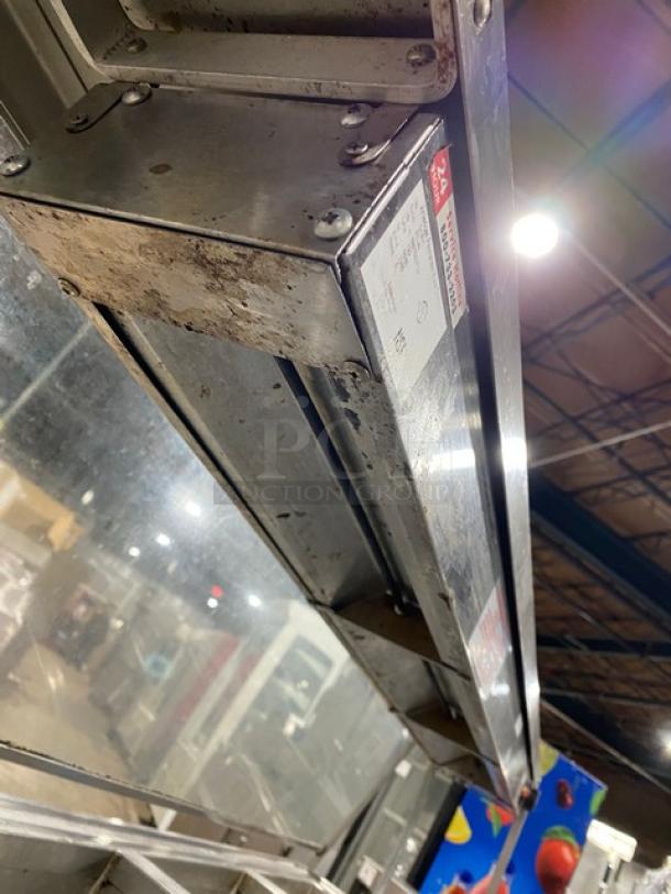 Atlas Metal 4 Bay Steam Table, model VIH4, with sneeze guard and lowering prep line, on casters. Serial n6772, 240V.