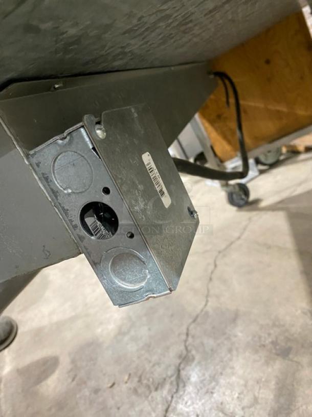 Atlas Metal 4 bay steam table, Model VIH4, with sneeze guard and caster wheels. Features 240V power, lowering prep/serve line.