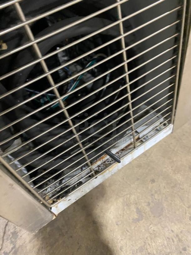 Master Bilt DC4DSE dipping cabinet with stainless steel construction, flip-top lids, visible fan enclosure. Model 115V 1Phase.