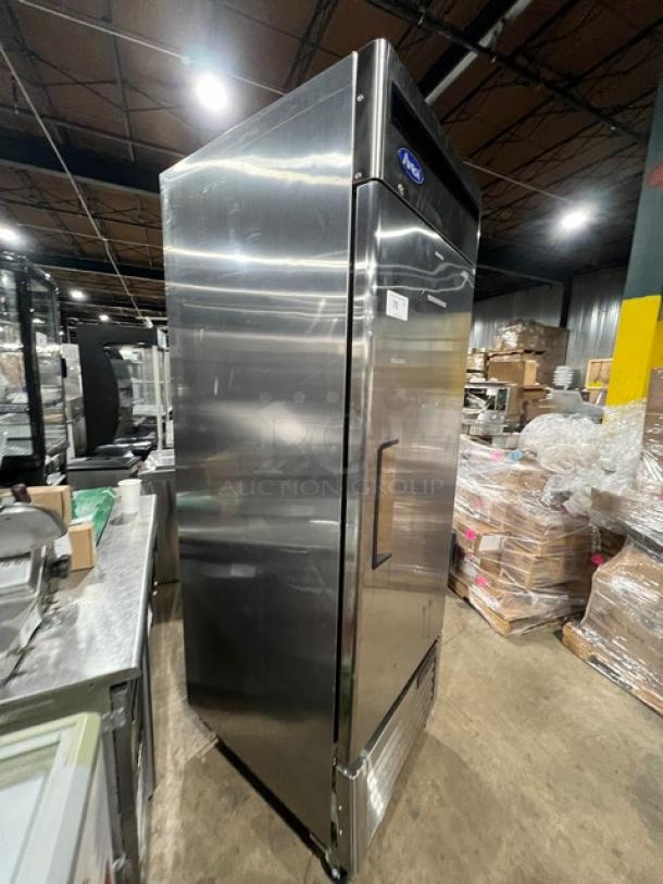 Atosa MBF8501GR single door reach-in freezer, stainless steel, on casters, with poly-coated racks, 115V 1Phase, in good condition.