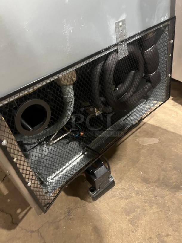 Atosa Commercial Single Door Reach-In Freezer, Model MBF8501GR, shown with back ventilation and wiring, on casters.