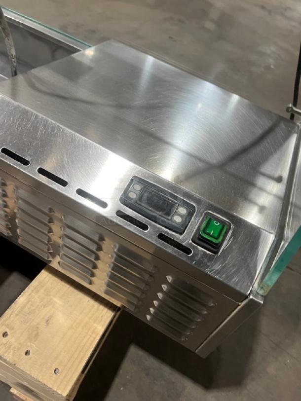 Stainless steel refrigerated cold rail with sneeze guard, model GPZ225AETL. Features control panel and green power switch.