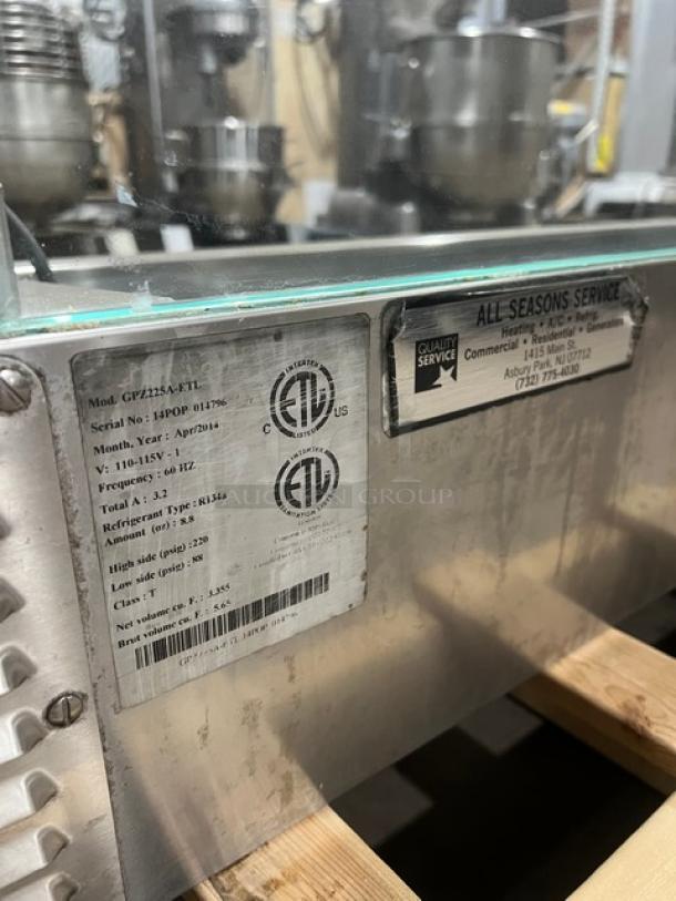 All stainless steel refrigerated cold rail with sneeze guard, model GPZ225AETL, 110/115V, 1 phase. Markings show specs and service info.