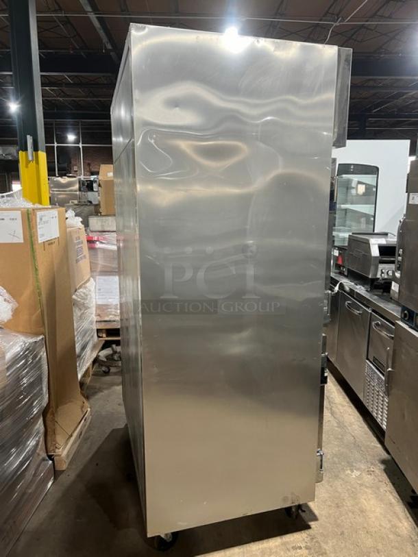 True commercial reach-in refrigerator, model STG2R4HS, stainless steel, four half doors, on casters, 115V, 1 phase.