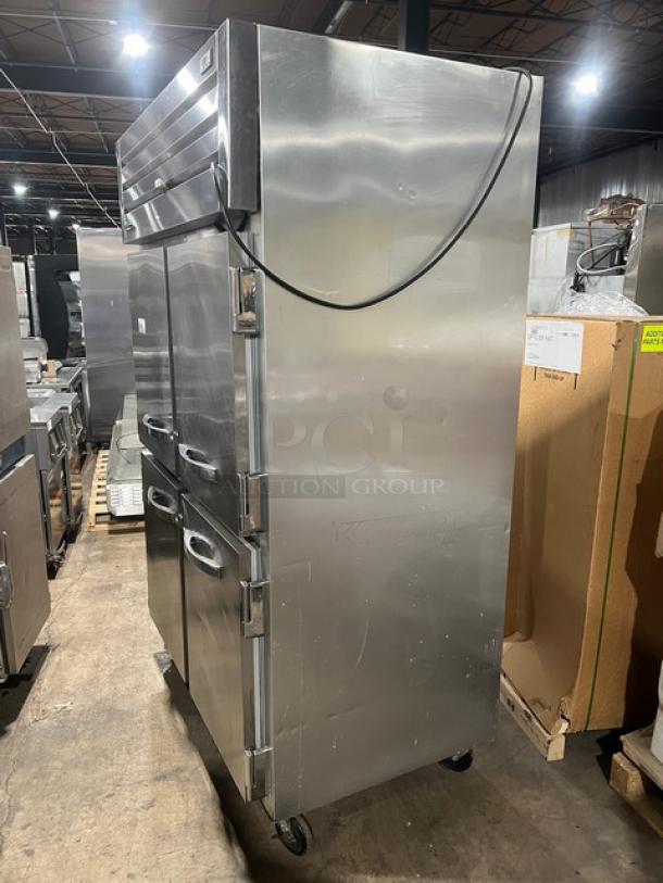 True commercial refrigerator, model STG2R4HS, with four half doors. Stainless steel. On casters. Serial 7630823. 115V, 1 phase.