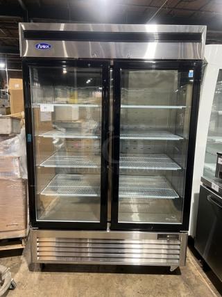 2018 Atosa 2-door commercial freezer, model MCF8703GR, with view-through doors and poly-coated racks, on casters.