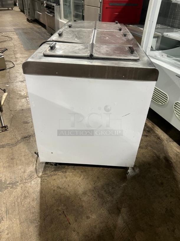 Alto Shaam ice cream/frozen yogurt dipping cabinet, model 1200TH, with 6 flip-top lids, on casters, 208/240V, 1 Phase.