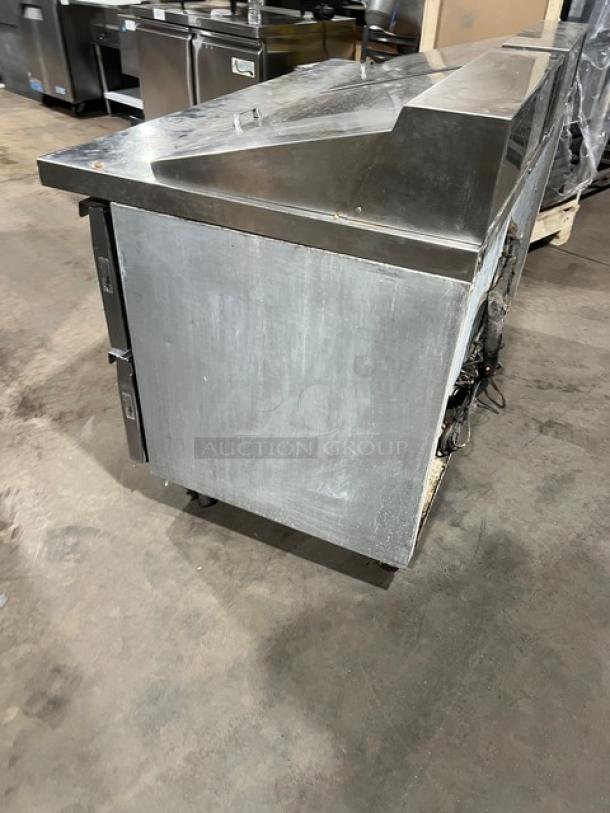 Continental SW6024M refrigerated sandwich prep table, stainless steel, 4 drawers, on casters, model SW6024M.