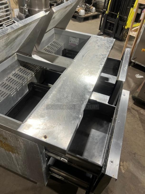 Continental SW6024M stainless steel refrigerated prep table, 4 drawers, on casters, used condition, model SW6024M, serial 151A9506.