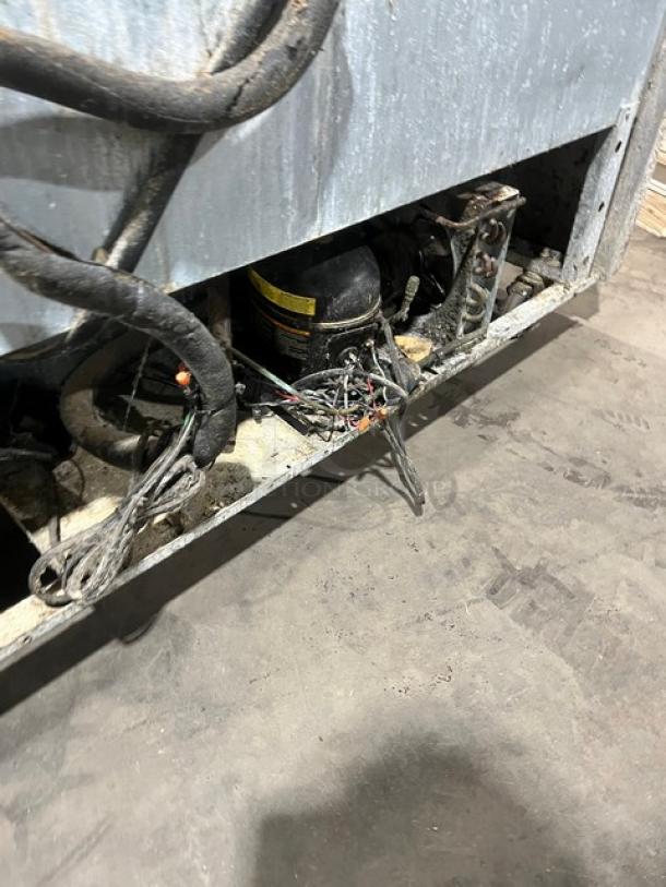 Continental refrigerated mega top sandwich prep table, model SW6024M. Features stainless steel, 4 drawers, casters. Serial: 151A9506.