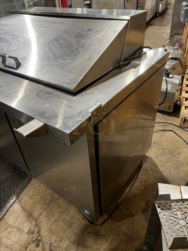 Hoshizaki SR48B18M stainless steel refrigerated prep table, 2-door storage, poly-coated racks, on casters, Model SR48B18M.