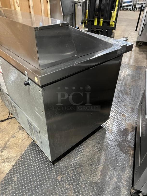 Hoshizaki SR48B18M refrigerated prep table, stainless steel, two-door storage, poly-coated racks, on casters, 115V.