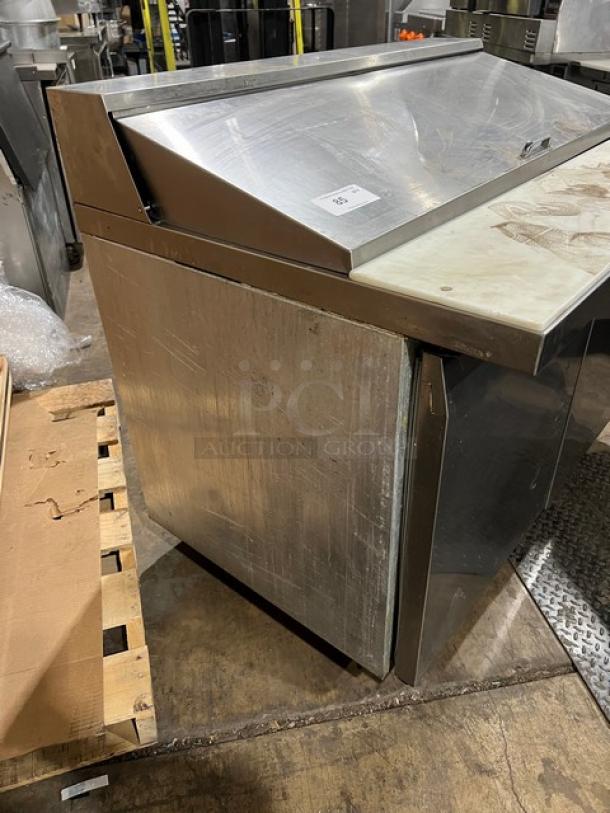 Continental SW4818M refrigerated prep table, stainless steel, 2-door storage, commercial cutting board, 115V, model shown.