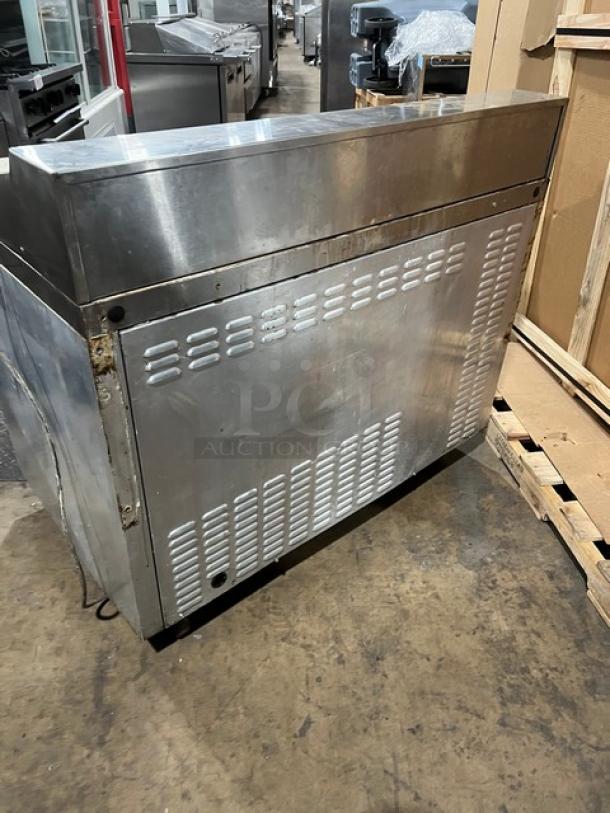 Continental SW4818M stainless steel refrigerated sandwich prep table with cutting board, 2-door storage, model 14907931.