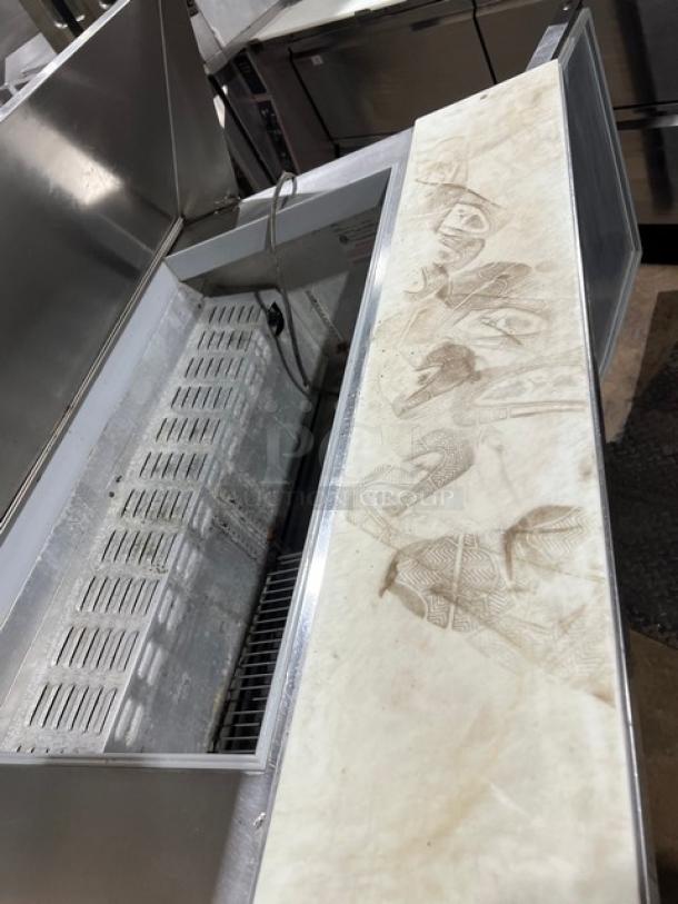 Continental SW4818M stainless steel refrigerated prep table with cutting board, 2-door storage, commercial use, 115V.