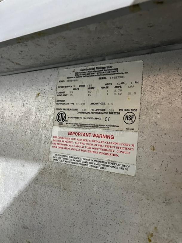 Continental SW4818M refrigerated sandwich/salad prep table, stainless steel, dual door storage, includes cutting board, serial 14907931.