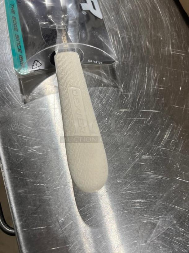 NEW! Dexter Sani Safe 10" Pot Fork, Model S203, with textured cream handle, in original packaging.