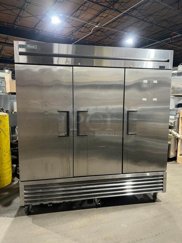 True Commercial 3 Door Reach-In Refrigerator, Model T72HC, stainless steel, serial 9346812, on commercial casters.