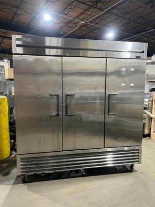 True Commercial 3 Door Reach-In Refrigerator, Model T72HC, stainless steel, serial 9346812, on commercial casters.