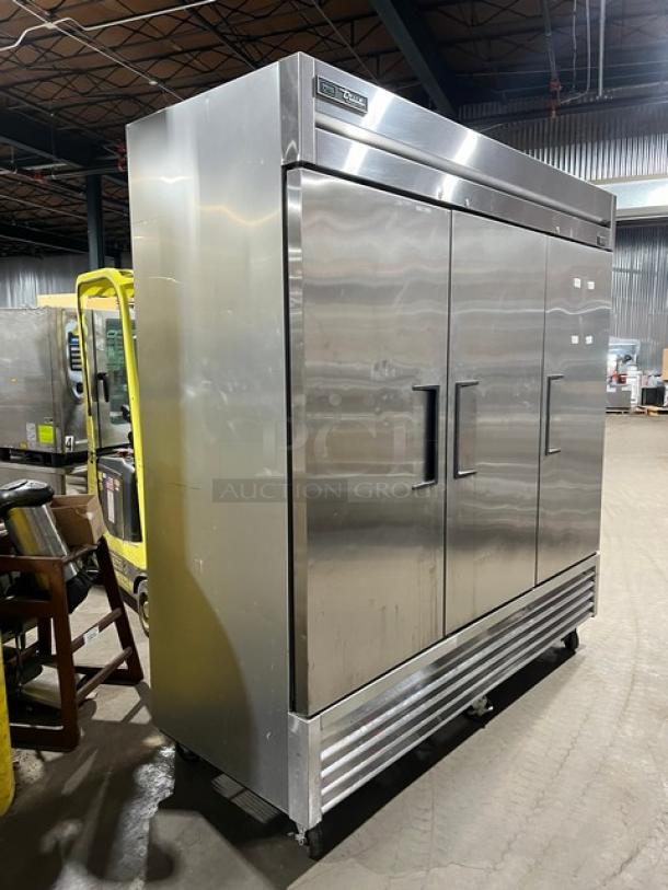 True T72HC commercial refrigerator, stainless steel, 3-door, on casters, model and serial tags visible, 115V 1Phase.