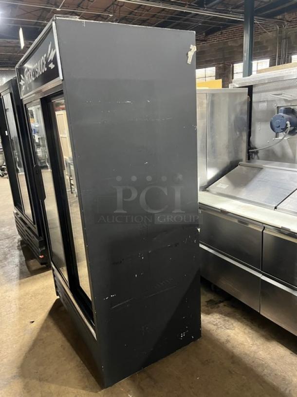 True GDM41 commercial 2-door refrigerator merchandiser with sliding view-through doors, model GDM41, serial AK9434A, in used condition.