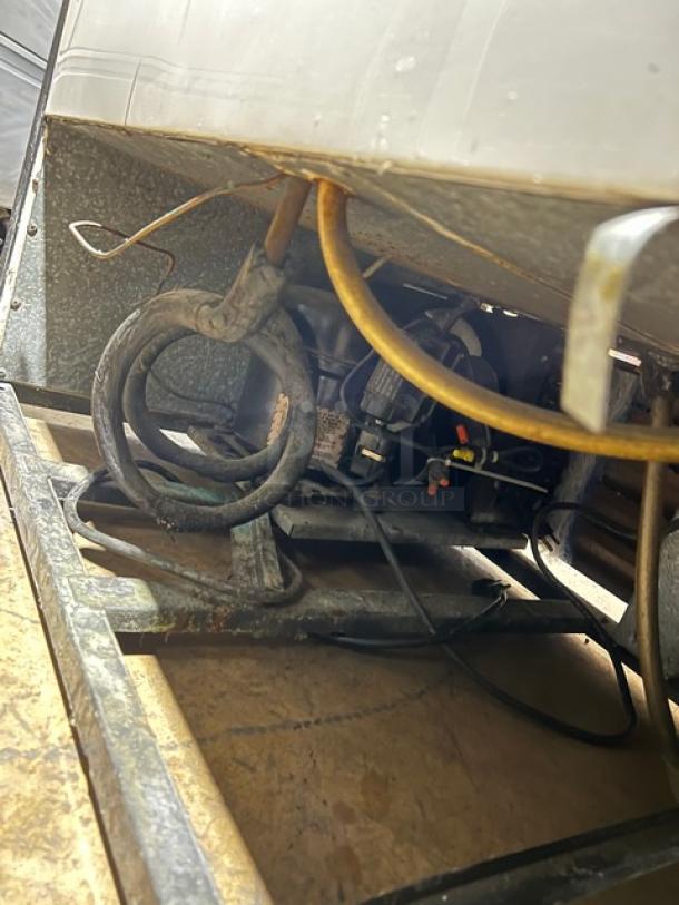 True GDM41 Commercial 2-Door Refrigerator with Sliding Glass. Model GDM41. Serial AK9434A. 115V 1Phase. Interior view showing wiring and components.