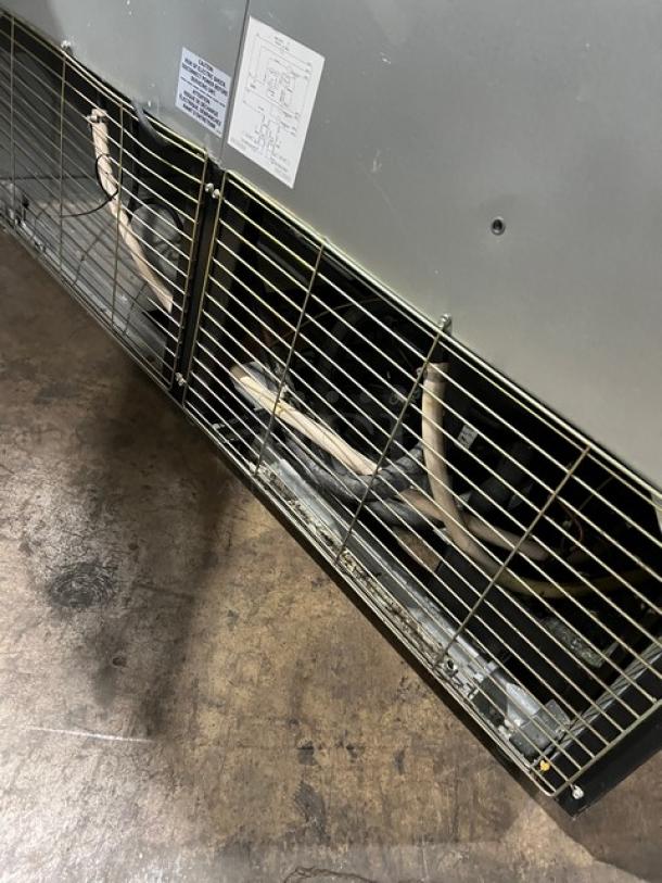 Imbera VRD43 commercial refrigerator, 2-door, 115V, 1 phase, sliding doors, serial 077141101130, visible wiring and parts.