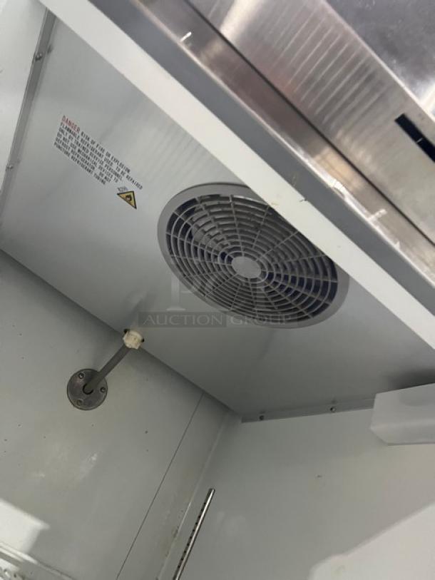 Grista GRRF1D commercial single door refrigerator interior view, showing fan and poly coated racks, stainless steel, 115V.