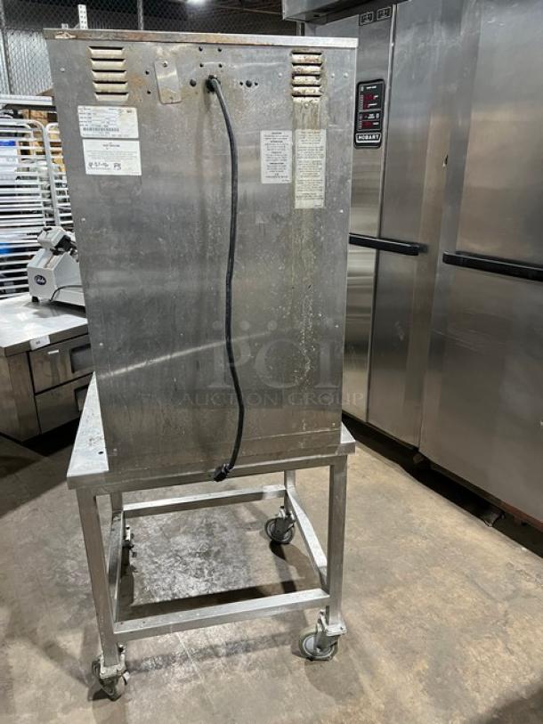 Alto Shaam Cook-N-Hold oven, Halo Heat Series, model 1000-TH/11, stainless steel, on equipment stand with casters, 120V, 1-phase.