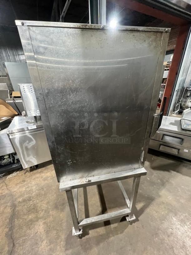 Alto Shaam 1000-TH/11 stainless steel Cook-N-Hold oven on commercial stand with casters. Model 1000-TH/11, 120V 1Phase.