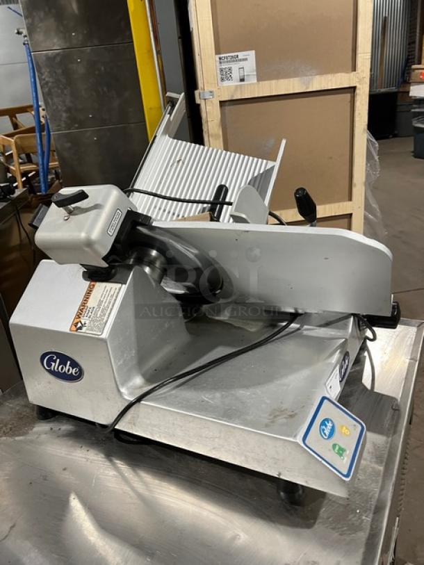 Globe S13 deli meat slicer, 13" blade, stainless steel, commercial countertop model, serial S13-00-000161, 110V 1 phase.