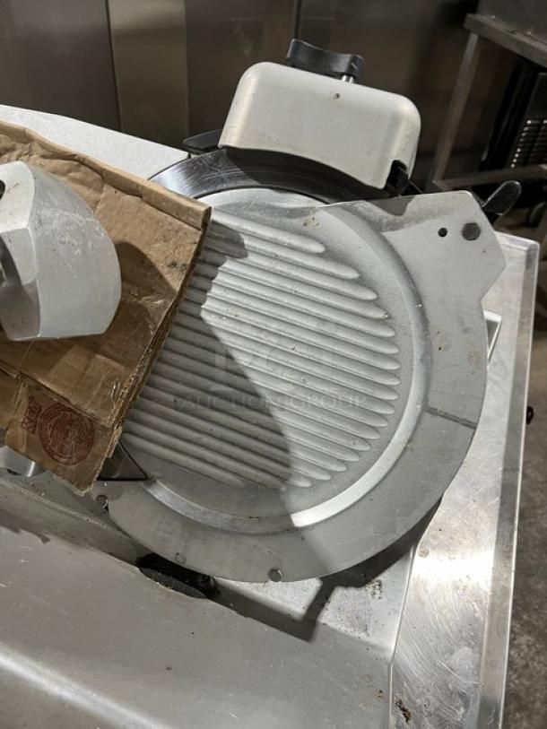 Globe S13 deli meat slicer, 13" blade, stainless steel, used condition. Model S13, Serial S13-00-000161, 110V 1Phase.