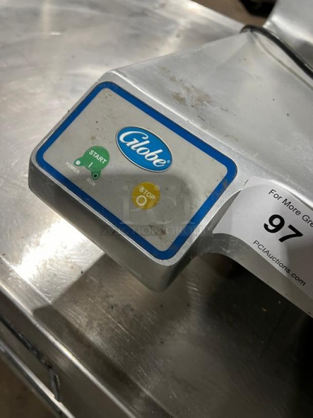 Globe S13 heavy-duty stainless steel deli meat slicer, 13" blade, model S13, serial S13-00-000161, 110V 1Phase, shows wear.