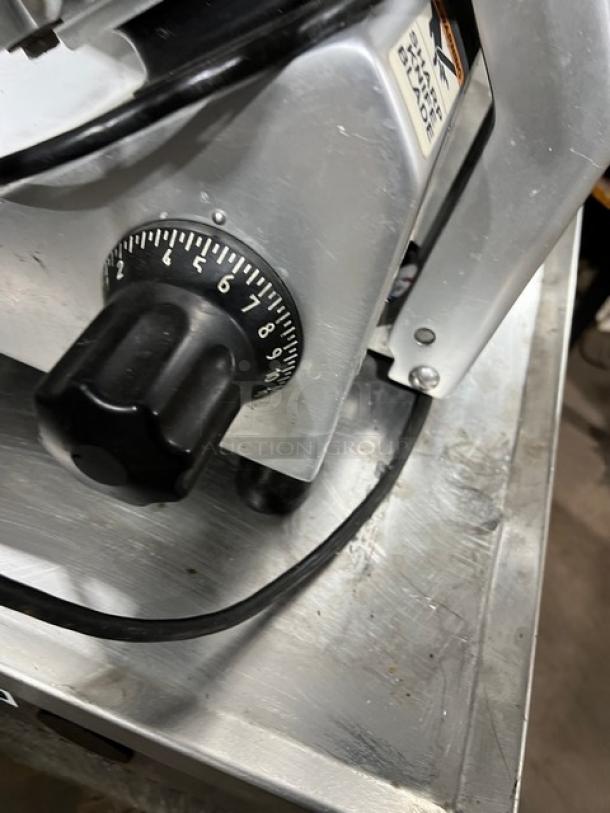 Globe S13 deli meat slicer, all stainless steel, 13" blade, heavy-duty, with adjustable thickness knob. Model S13, Serial S13-00-000161.