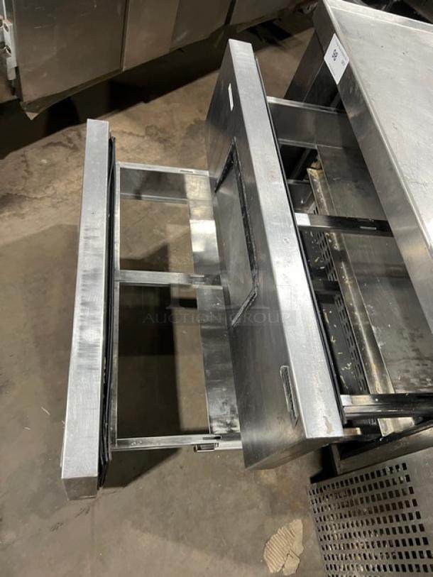 True TRCB48 commercial refrigerated chef base, stainless steel, 48" with 2-drawer storage, serial 5218432, on casters.