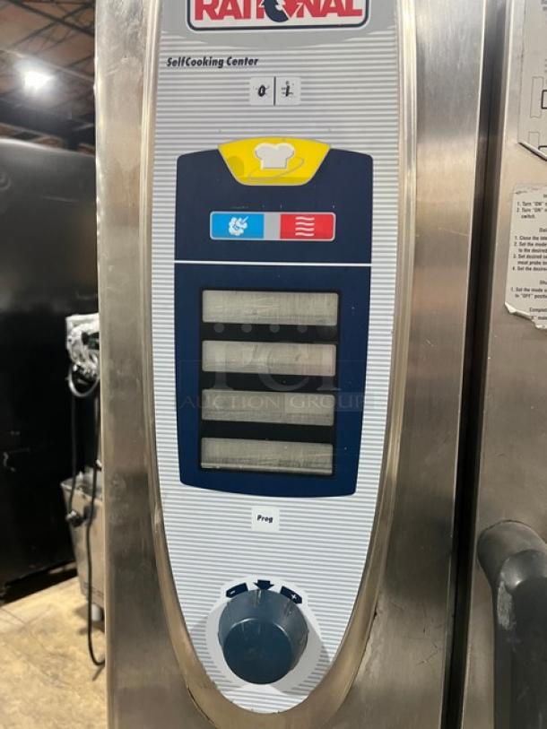 Rational SCC101G combi oven control panel, stainless steel, view-through door, mounted on a commercial equipment stand.