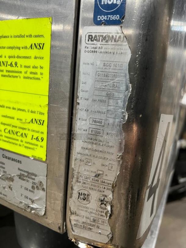 Rational SCC101G Combi Oven, stainless steel, view-through door, on equipment stand, serial G11SE070821115, ANSI compliance labels visible.